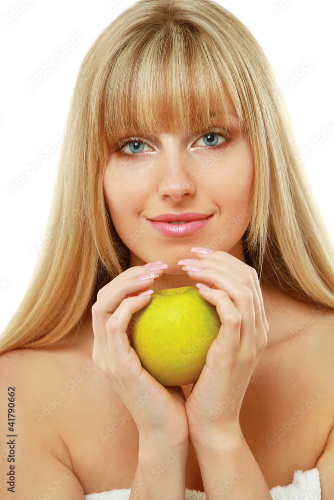 A portrait of beautiful young woman with a green apple A portrait of beautiful young woman with a green apple