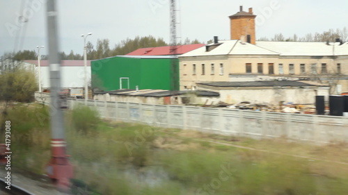 The View from express train window to industrial zones photo