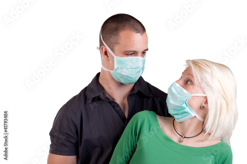 young people wearing flu masks