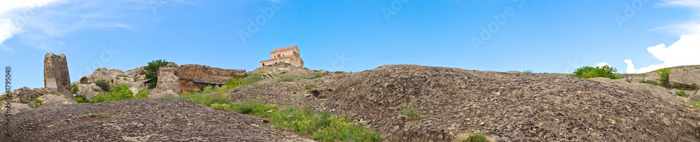 panorama of ruins of cave-dwelling town Uplistsikhe panorama of ruins of cave-dwelling town Uplistsikhe