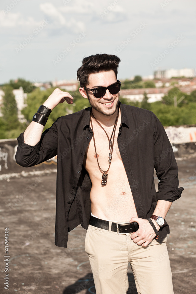 handsome young male fashion model, unbuttoned shirt handsome young male fashion model, unbuttoned shirt