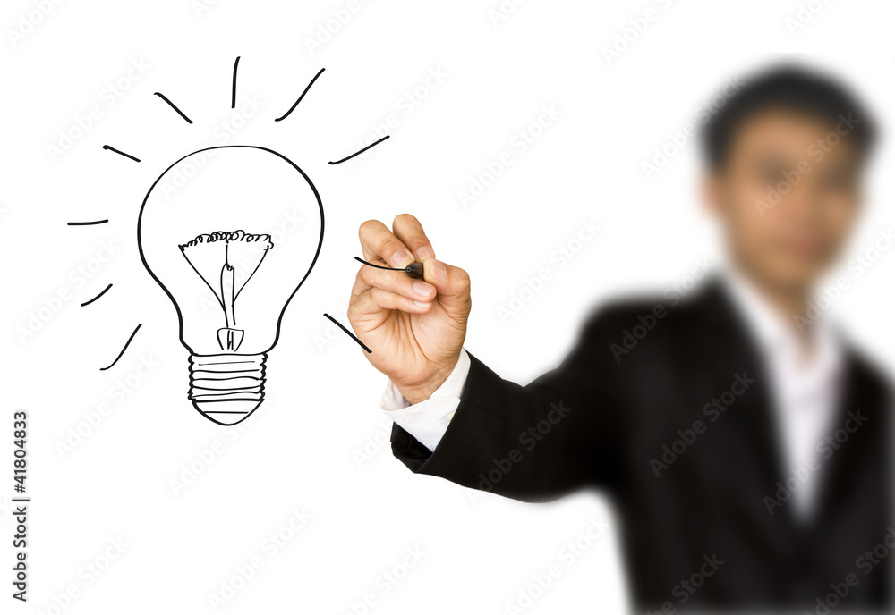 Businessman hand drawing a social network scheme on a whiteboard Businessman hand drawing a social network scheme on a whiteboard