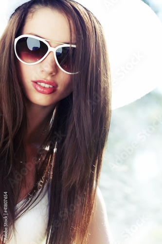 Summer woman in swimsuit and hat