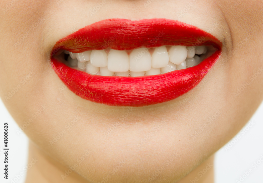 Obraz premium Beautiful young woman teeth. Isolated over white background
