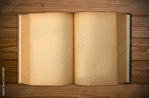 Old book with blank yellow stained pages 