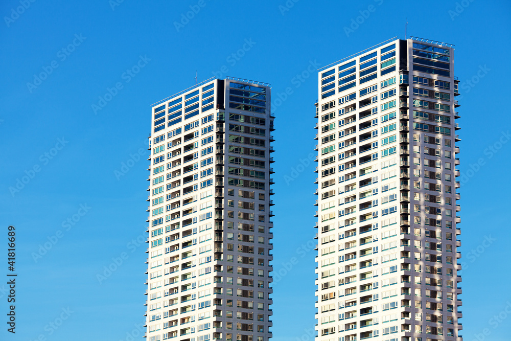 Beautiful modern office building against the blue sky Beautiful modern office building against the blue sky