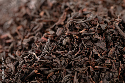 Photos Earl Grey  black loose tea leaves background, shallow dof
