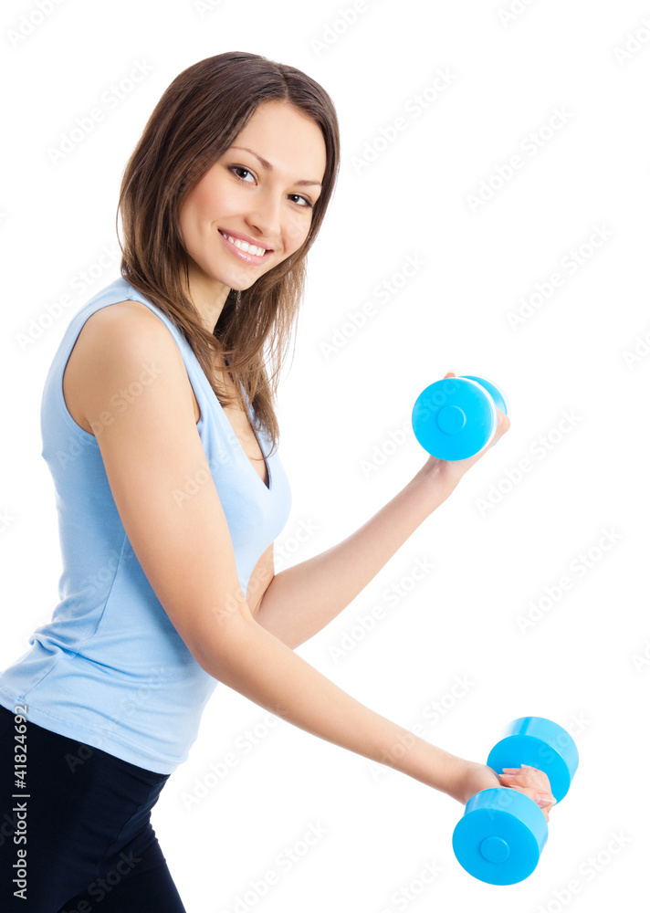 Young woman exercising with dumbbells, isolated Young woman exercising with dumbbells, isolated