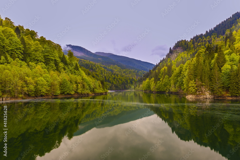landscape with a mountain lake in spring landscape with a mountain lake in spring