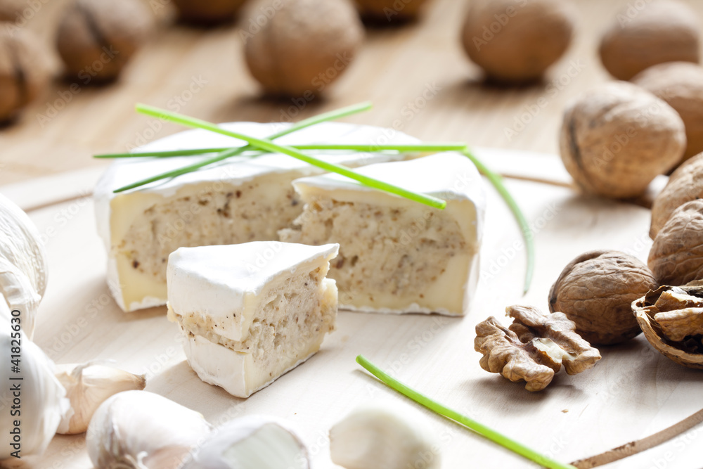 cheese brie filled with cheese mixture of chopped walnuts and ga cheese brie filled with cheese mixture of chopped walnuts and ga