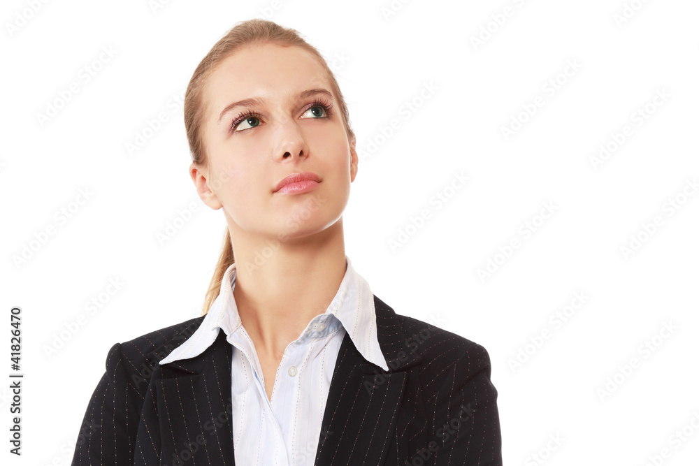 A young successful businesswoman looking up A young successful businesswoman looking up