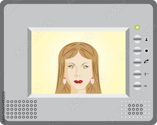 Intercom with video display. Woman using an intercom.