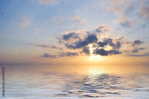 blue fantastic ocean sunrise at cloudy weather