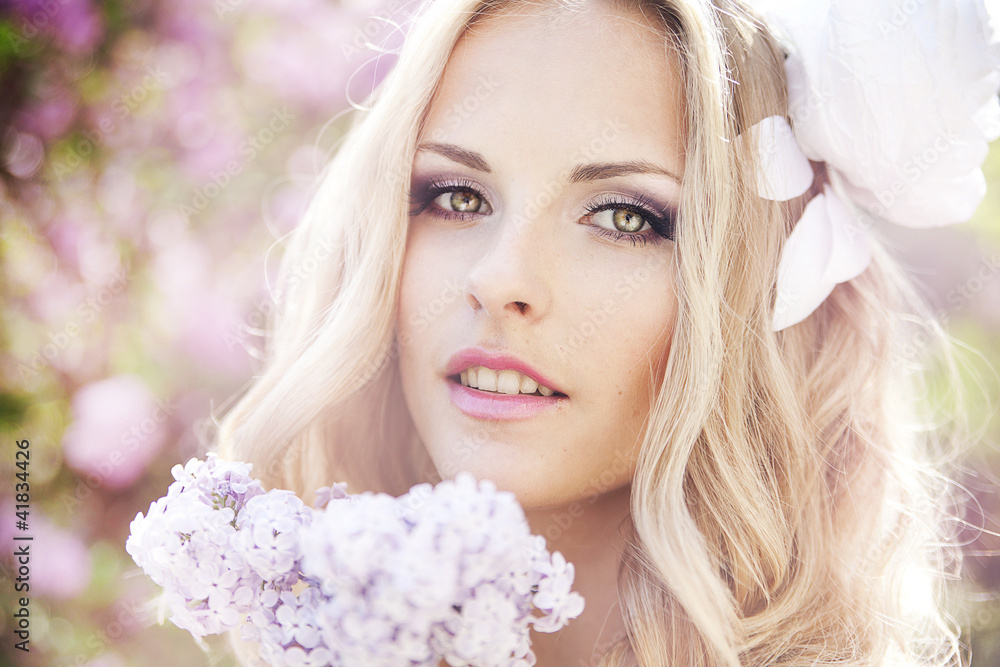 Fototapeta premium beautiful girl in a lavender garden