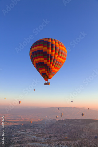Balloons in the sky over Cappadocia at sunrise