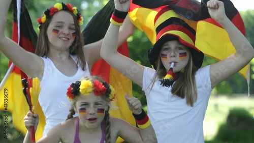 three girls cheering for the german team with sound