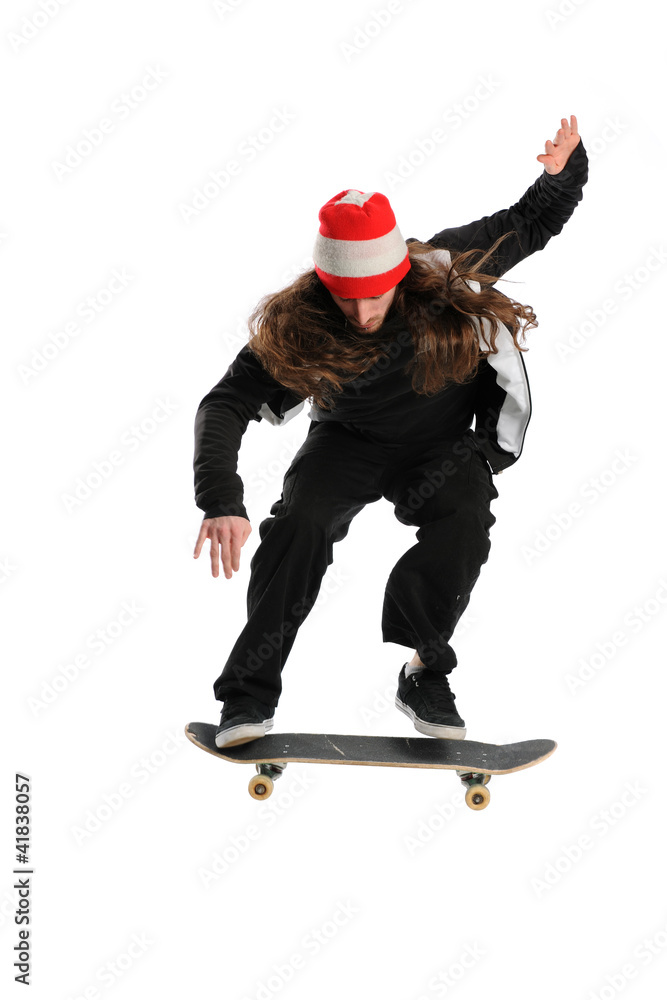 Obraz premium Young man jumping on a skateboard