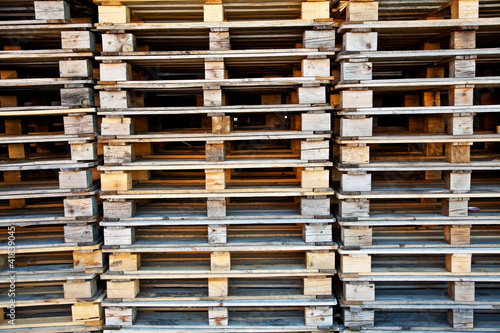 Piles of wooden pallets.