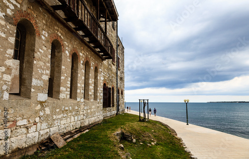 Old House on the Sea Shore in Porec, Croatia photo