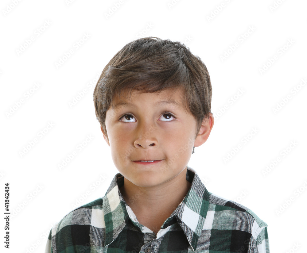 Young boy looks up to copy space Young boy looks up to copy space