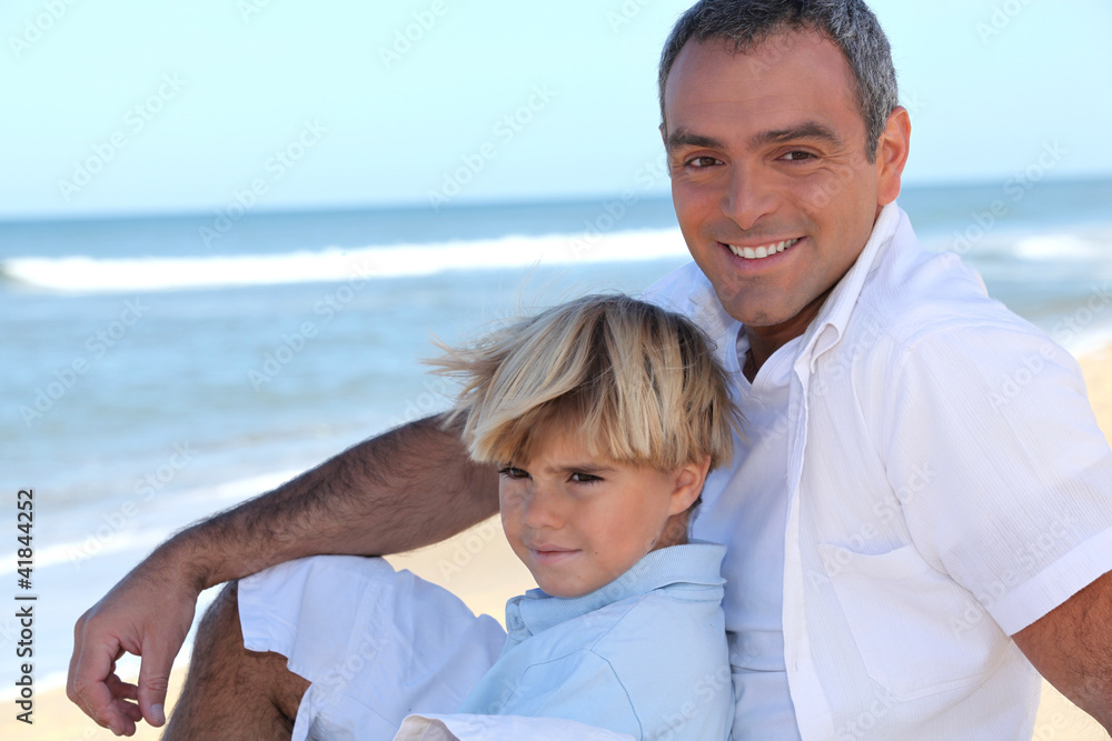 Father with his son at the beach