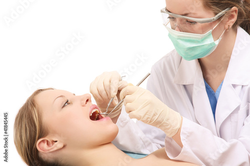Examining patient s teeth