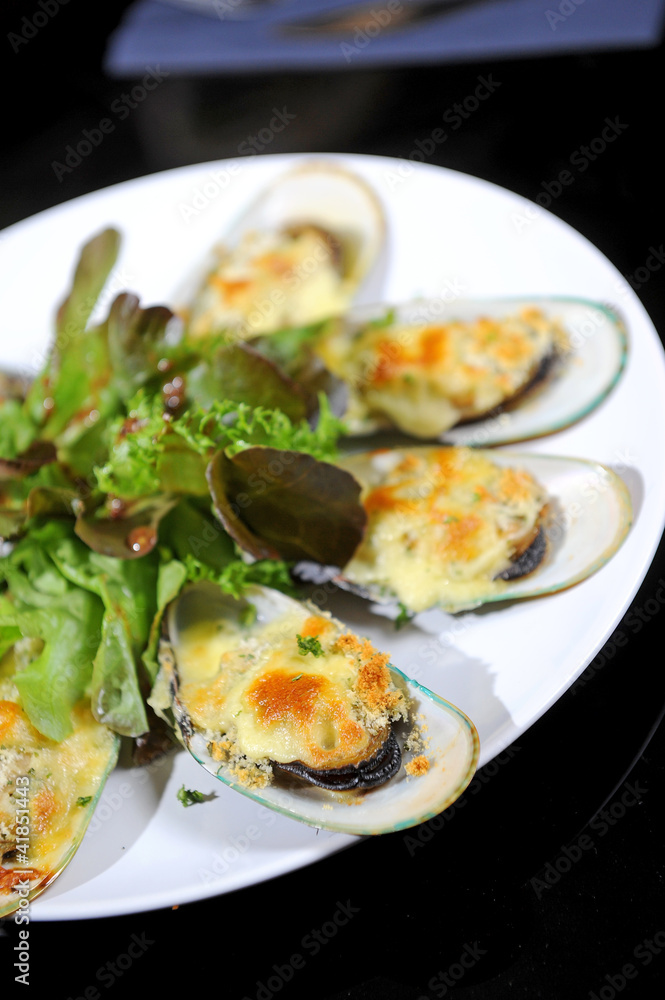 mussels under cheese mussels under cheese