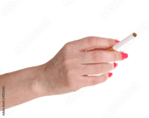 Cigarette in female hand isolateed on white