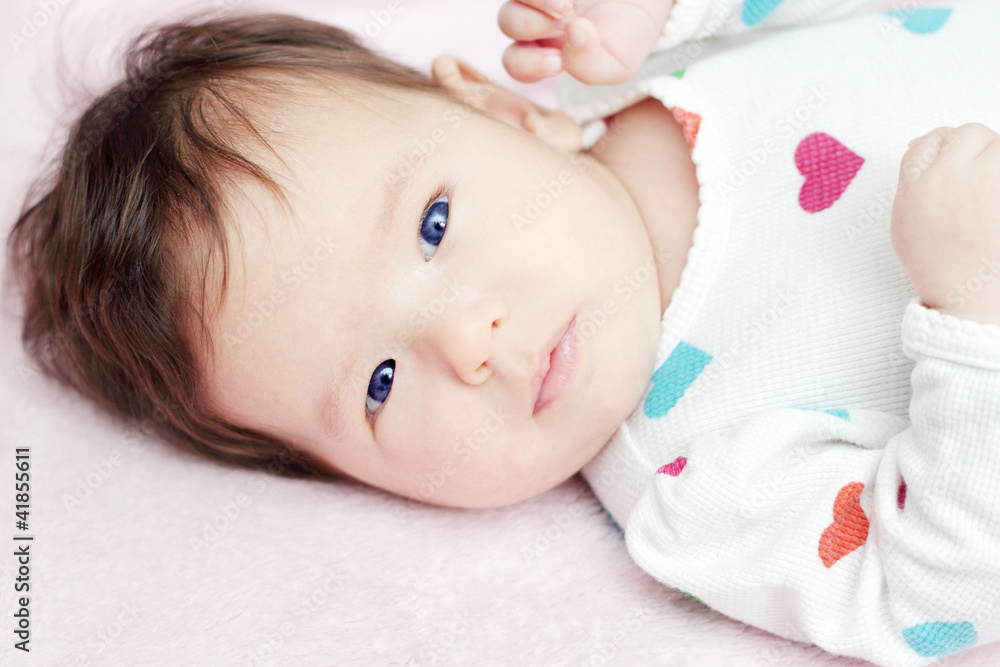 Adorable baby looking at camera (two months old) Adorable baby looking at camera (two months old)