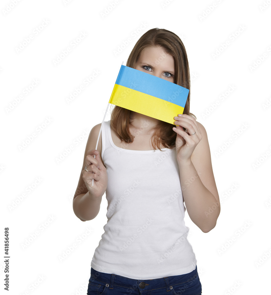 Attractive woman hides her face behind flag of Ukraine Attractive woman hides her face behind flag of Ukraine