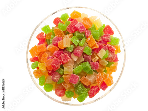 Candied fruits in a glass bowl.