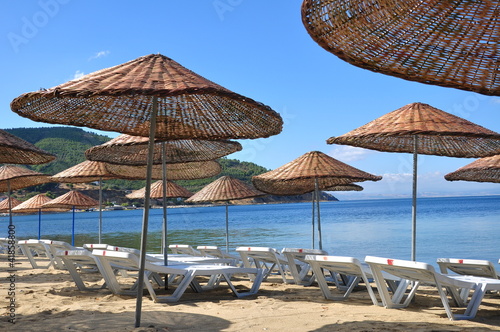 The beach umbrellas and chairs on beach