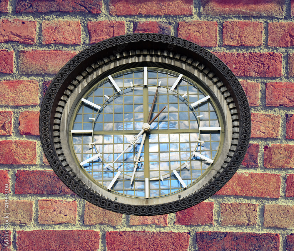 Clock on brick wall Clock on brick wall
