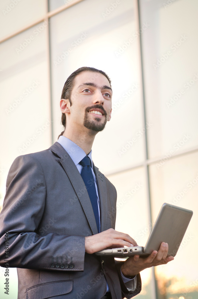 Young businessman on the street Young businessman on the street