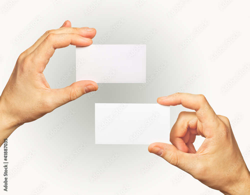 Obraz premium Business card in hands