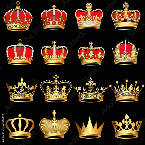 set gold  crowns on black background photo