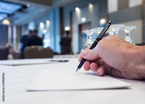 Conference room with tables with hand