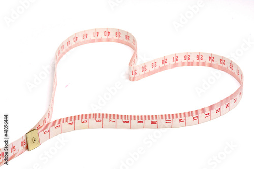 A measuring tape shaping a heart