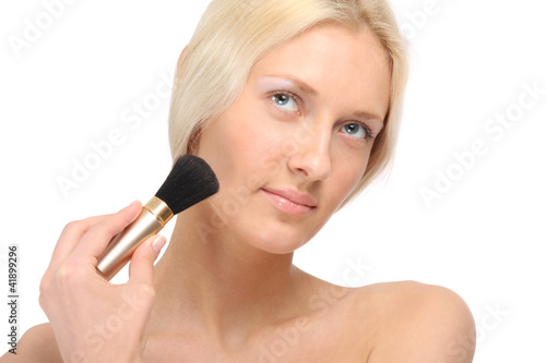 A beautiful woman with a brush