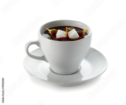 фотографія Cup of coffee with falling sugar cube