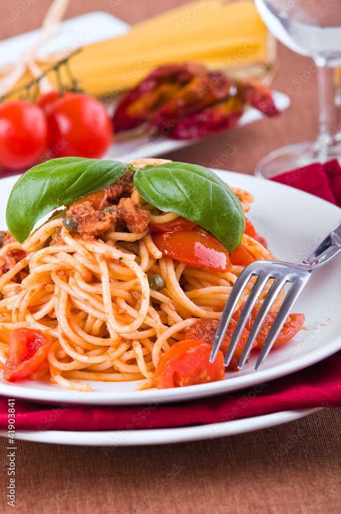 Spaghetti with tuna, cherry tomatoes and capers. Spaghetti with tuna, cherry tomatoes and capers.