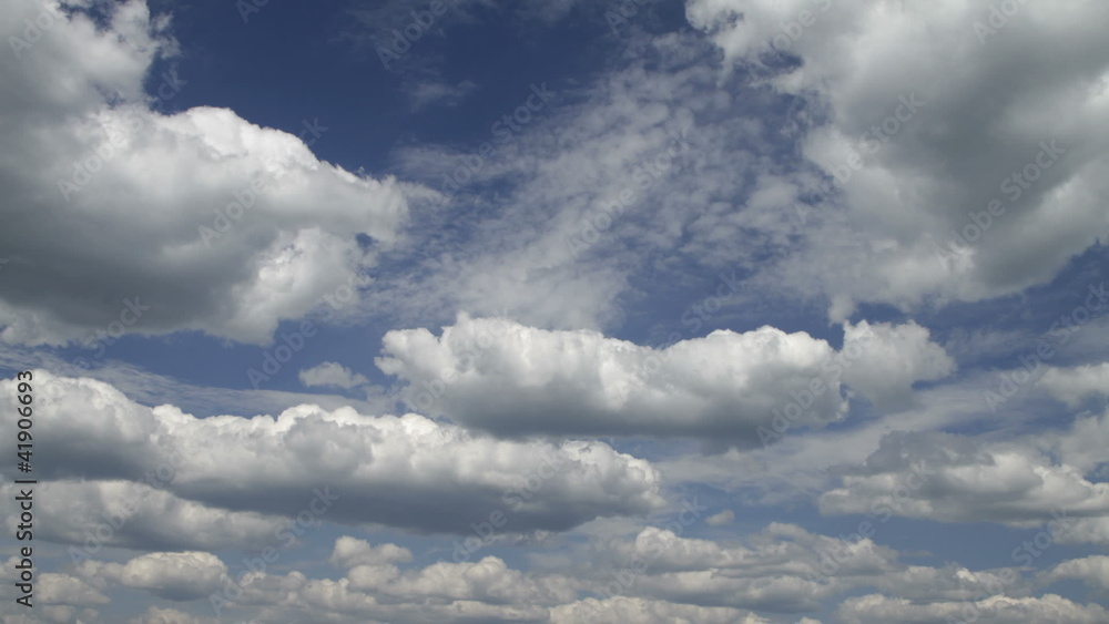 time lapse clip of white fluffy clouds over blue sky time lapse clip of white fluffy clouds over blue sky