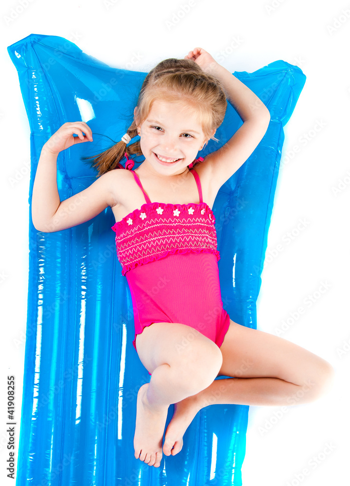 Child girl in swimming suit store