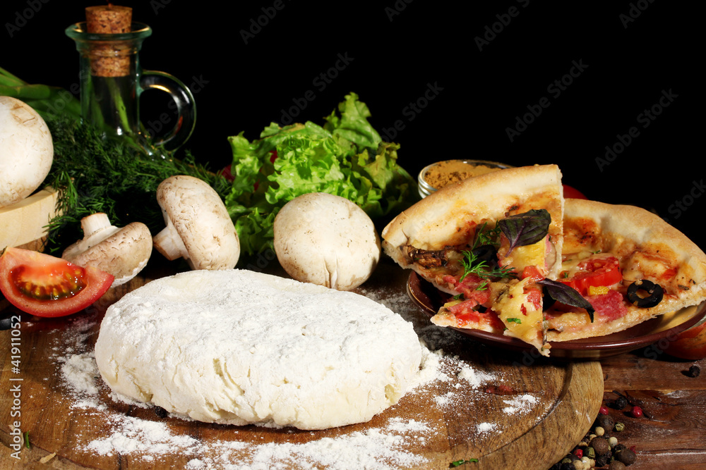 Fototapeta premium delicious pizza dough, spices and vegetables