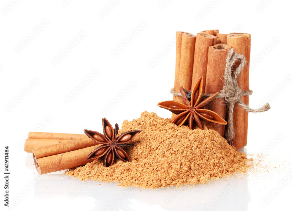 Cinnamon sticks, powder and anise isolated on white Cinnamon sticks, powder and anise isolated on white
