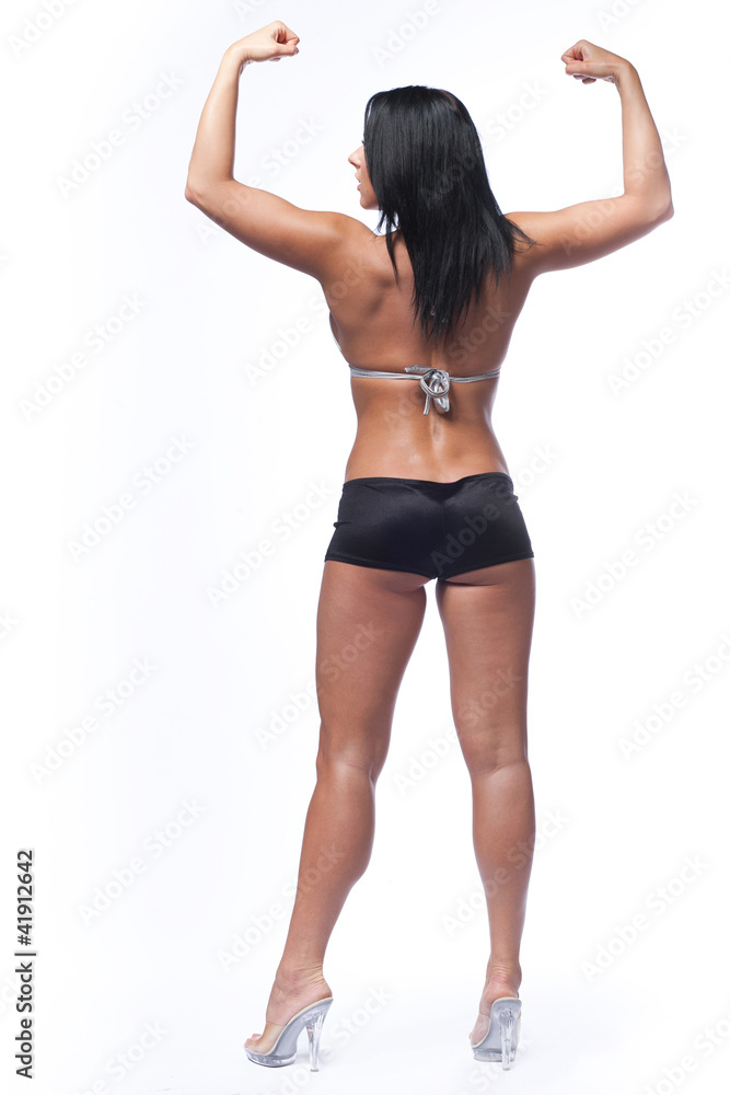 Fitness model with long black hair. Fitness model with long black hair.