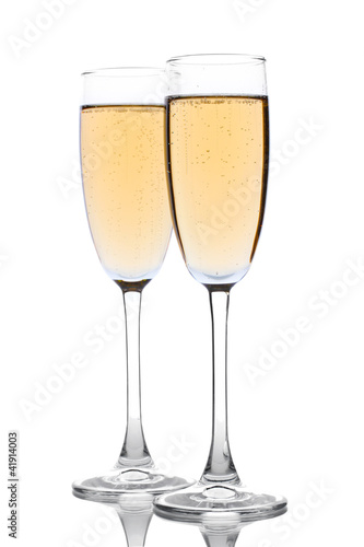 glasses of champagne isolated on a white