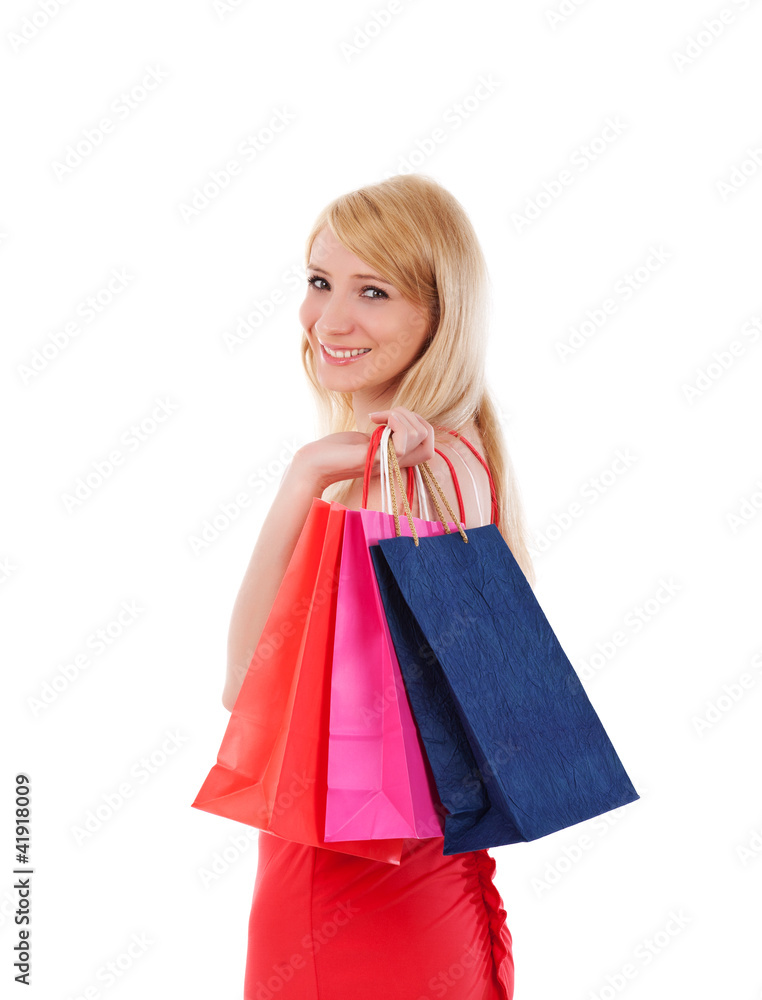 woman smiling holding shopping bags