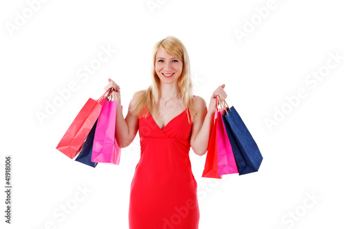 woman smiling holding shopping bags