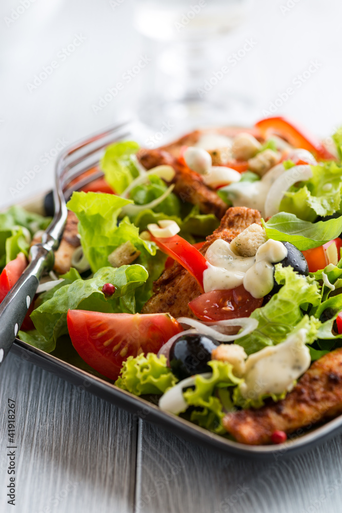 Chicken salad with garlic sauce and black olives Chicken salad with garlic sauce and black olives